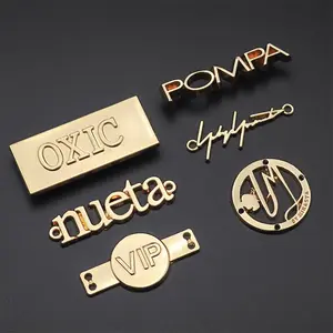 Personalizza Il commercio all'ingrosso di abbigliamento di marca del metallo personalizzato etichette di abbigliamento in metallo decorativo sacchetto di tag in metallo logo