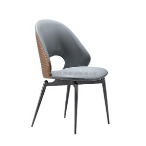Modern Luxury Stylish Dining <b>Chairs</b> Open Back Woven Leather Detail High Dense <b>Padding</b> Metal Legs Customizable Color Dining - Product Image 1