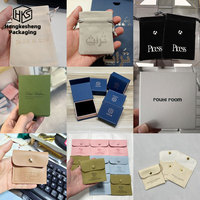 HKSLW Vente en gros de pochettes à bijoux rondes miniatures personnalisées, sacs en microfibre pour colliers, bracelets, bagues, pour usage personnel