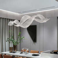Lustre moderne et élégant en cristal transparent pour salle à manger, îlot de cuisine, escalier, avec perles de cristal de luxe et design en ruban longue vague