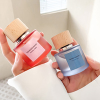 Emballage de parfum vietnamien en verre 30ml vaporisateur fantaisie nouvelles bouteilles de parfum de luxe rose avec bouchon en bois