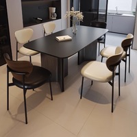 Chaise de salle à manger noire minimaliste, dossier incurvé ergonomique, pieds en métal, luxe moderne pour la maison, le café, l'hôtel