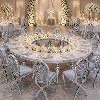Tables sur mesure en acier inoxydable avec plateau en verre blanc et pieds en forme de pattes d'éléphant pour hôtels, mariages, banquets, fêtes et événements