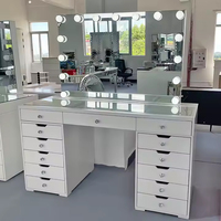 Coiffeuse de luxe européenne en bois, best-seller, avec miroir éclairé et lumières LED réglables, et tabouret