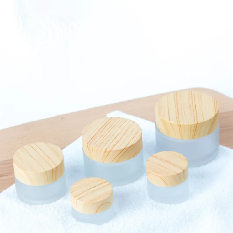 Factory Supply 5g 10g 15g 30g 50g 100g glass frosted food candy packaging clear pet cosmetic cream jar with bamboo lid