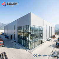 Entrepôt en acier préfabriqué robuste à poutres en H, centre logistique de grande envergure, bâtiment d'atelier industriel, conception modulaire