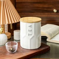 Vente en gros de nouveaux ustensiles de cuisine créatifs de qualité alimentaire ensemble de boîtes à café en céramique boîte de rangement personnalisée en relief pour le thé et le sucre avec couvercle en bambou