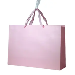 高档加厚白纸板纯色粉色手提袋服装礼品袋
