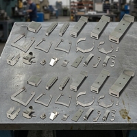 Stampo per Punzonatura di Lamiere Metalliche a Forma Speciale Personalizzata, Stampo per Stampaggio Hardware Multistazione, Fabbricazione di Stampi per la Casa Intelligente in Vendita