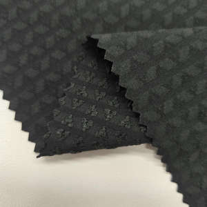 150D Wing-Design Jacquard Senderismo Tela 190GSM 92% P 8% Sp 75D/40D Hilo compuesto Pluma-Textura y flexible para pantalones de senderismo - Product Image 1