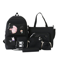 Tas Ransel Kanvas Grosir Desain Baru Wanita Kapasitas Besar 5-in-1 Set Siswi Lucu Boneka Plush Tas Ransel Dompet