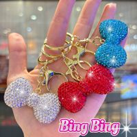 Porte-clés de luxe scintillant avec nœud en cristal, breloque de sac à la mode avec strass, pendentif décoratif pour voiture, cadeau d'anniversaire pour femme