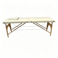 Table de massage portable de haute qualité à 2 sections, pieds en bois, pliable, lit de thérapie pour spa et beauté