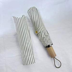 Paraguas manual reforzado con varilla recta de 8 nervaduras, mango de madera maciza, 98 cm de diámetro abierto, protección UV y resistente al viento, diseño a rayas transfronterizo. - Product Image 1