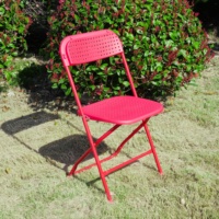 Chaise pliante légère et portable en plastique perforé pour événements, banquets et formations, idéale pour l'intérieur et l'extérieur, vente en gros