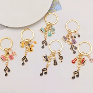 พวงกุญแจโลหะรูปกีตาร์สุดฮิต ดีไซน์เก๋ แฟชั่นสำหรับคนรักดนตรี ใช้ตกแต่งกระเป๋าได้ - Product Image 4