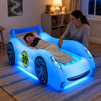 Lit gonflable pour enfants en forme de voiture avec lumières LED, matelas pneumatique en PVC pour les séjours d'enfants, voyages, OEM ODM