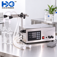 Machine de remplissage semi-automatique à double tête pour liquides, eau, boissons, jus, emballage de bouteilles en plastique et petite ligne de production