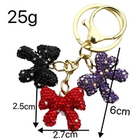 Porte-clés papillon de dessin animé, pendentifs créatifs incrustés de diamants, breloques de sac en strass, petits cadeaux en gros