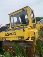 Rouleau compresseur vibrant à double tambour d'occasion Bomag BW202AHD-2, moteur diesel Honda, force de compression 28KN, modèle 2004, en excellent état