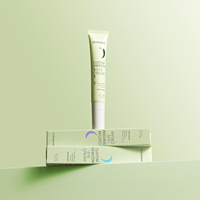 Emballage personnalisé pour crème pour les yeux en alliage métallique avec applicateur de massage en alliage de zinc, tube souple en plastique vide
