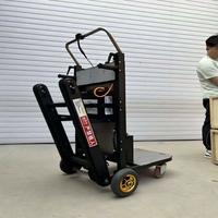 Véhicule électrique supérieur pour la montée d'escaliers capable de transporter sans effort les meubles et les matériaux de construction vers les étages supérieurs