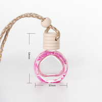Diffuseur de parfum pour voiture en verre transparent/couleur, forme ronde, 10 ml, avec logo personnalisé, bouchon en bois et joint à vis.