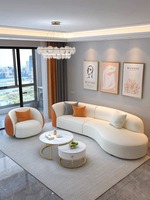 Sofa incurvé simple moderne et table de thé ensemble pour petit appartement salon