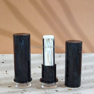 Tube à lèvres vide de luxe rond noir gaufré avec logo personnalisé, conteneur rotatif pour baume à lèvres cosmétique avec base transparente - Product Image 4