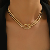 Ensemble de bijoux pour femmes, collier et bracelet en chaîne de serpent double plate plaquée or et rhodium, nœud torsadé en fer