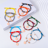Bracelets en corde tressée en acier inoxydable plaqué or rose 18 carats faits à la main par Ywyougang, unisexes, tendance, avec charme en forme de cœur, personnalisables, cadeau familial