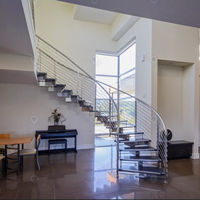 Escaliers Courbes sur Mesure avec Garde-Corps en Verre Trempé Style Minimaliste Escaliers Courbes pour Bâtiments Résidentiels