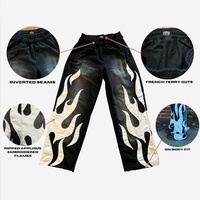 Pantalon évasé en coton personnalisé pour homme, avec broderie effet flamme et patch appliqué, style survêtement évasé pour homme