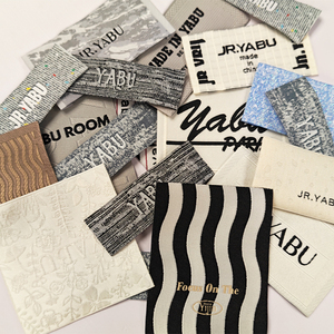 JINRUI Katlamalı Dokuma Giysi Etiketi, Kumaş Bakım Etiketi, Özel Logo Baskılı Pamuklu Etiketler, Giysi Etiketleri - Product Image 3