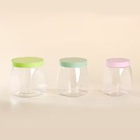 Pot en plastique rond PET transparent avec couvercle, idéal pour les poudres de remplacement de repas, les noix, les bonbons, les biscuits et les snacks, avec couvercle à ouverture facile et scellé.