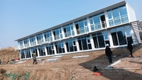 Maison Conteneur Préfabriquée Moderne en Gros, Prête à Assembler, Emballage Plat, Anti-Rouille, Résistante au Vent, Idéale pour Chambre et Usage Commercial