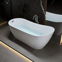 Baignoire autoportante en acrylique blanc 1,7 m, moderne, avec fonction massage et drain central, pour salle de bain d'hôtel