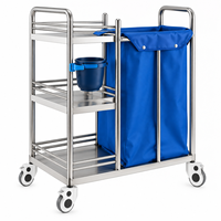 Chariot de blanchisserie en acier inoxydable pour soins infirmiers avec rangement à trois niveaux et poteau porte-perfusion pour le transport du linge et des déchets hospitaliers