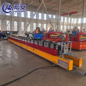 Machine de formage à froid pour rail de porte à enroulement, machine de formage servo-hydraulique pour rail de guidage de porte à enroulement - Product Image 4