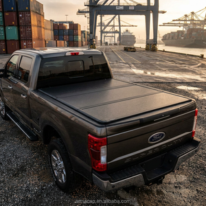 Couverture de benne de camion pliable en trois parties en alliage d'aluminium robuste et très résistante (880 lbs) pour Navara NP300 / Frontier / Ford F150 de 6,1 à 6,5 pieds (2026) - Product Image 1