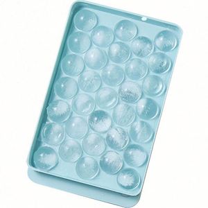 RAYBIN Moule à glaçons sphériques en plastique à 33 cavités, bac à glaçons rond avec couvercle et pelle pour congélateur - Product Image 1