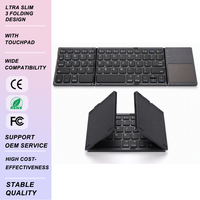 Clavier sans fil 2,4 G ultra-plat pliable en 3 parties, rechargeable, 61 touches, pavé tactile, pliable pour iPad, Android, Windows, vente en gros, OEM