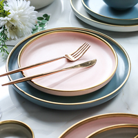 Ensemble d'assiettes à dessert rondes en céramique porcelaine or blanc de haute qualité pour mariage personnalisé avec rebord doré pour restaurant