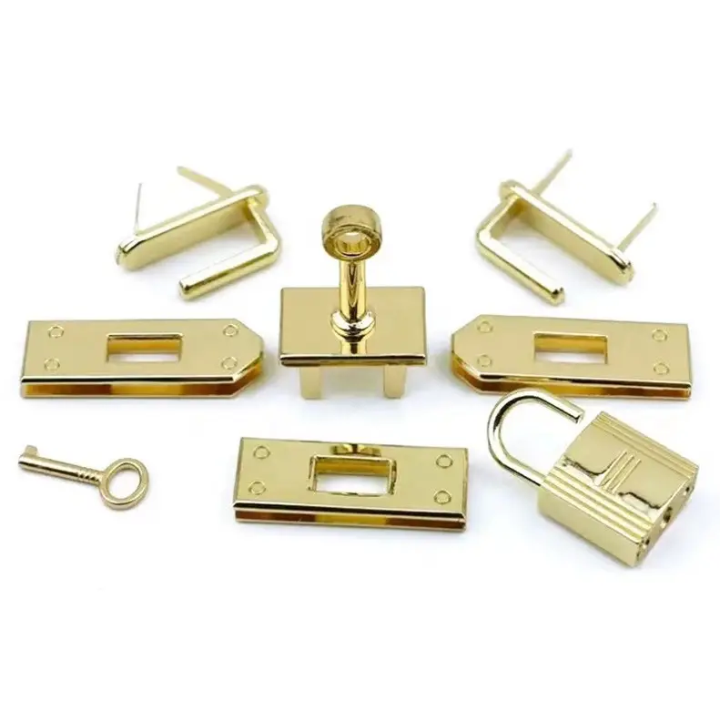 Set di serrature in metallo twist con logo personalizzato di alta qualità in lega di zinco colore oro lucido turn lock per la decorazione della borsa in pelle