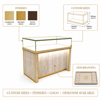 Maßgefertigte Steinverkleidung Goldener Metallrahmen Schmuck-Vitrine LED-Beleuchtung Glas-Top-Schaukasten Halsketten-Shop Großhandel Einkaufszentrum