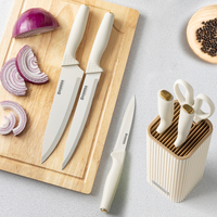Ensemble de couteaux de cuisine blancs personnalisés avec étiquette privée, fabrication OEM professionnelle, 7 pièces, acier inoxydable, poignées ambidextres, lames revêtues
