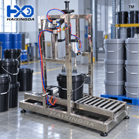 Machine de capsulage pneumatique semi-automatique durable pour seaux et fûts en plastique, avec presse à liquide et alimentateur de table à vide d'air