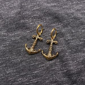 Pendientes de acero inoxidable yunnique con diseño minimalista en tono dorado para hombres y mujeres - Product Image 4