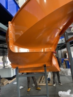Système de chemin de descente en spirale industriel Truelisort pour une manutention efficace des colis et un flux continu de matériaux dans les entrepôts de distribution