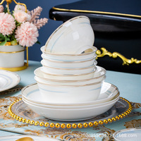 Service de vaisselle haut de gamme en porcelaine fine de Jingdezhen, avec bord doré, compatible micro-ondes, peint à la main, style minimaliste moderne, pour la maison, luxe